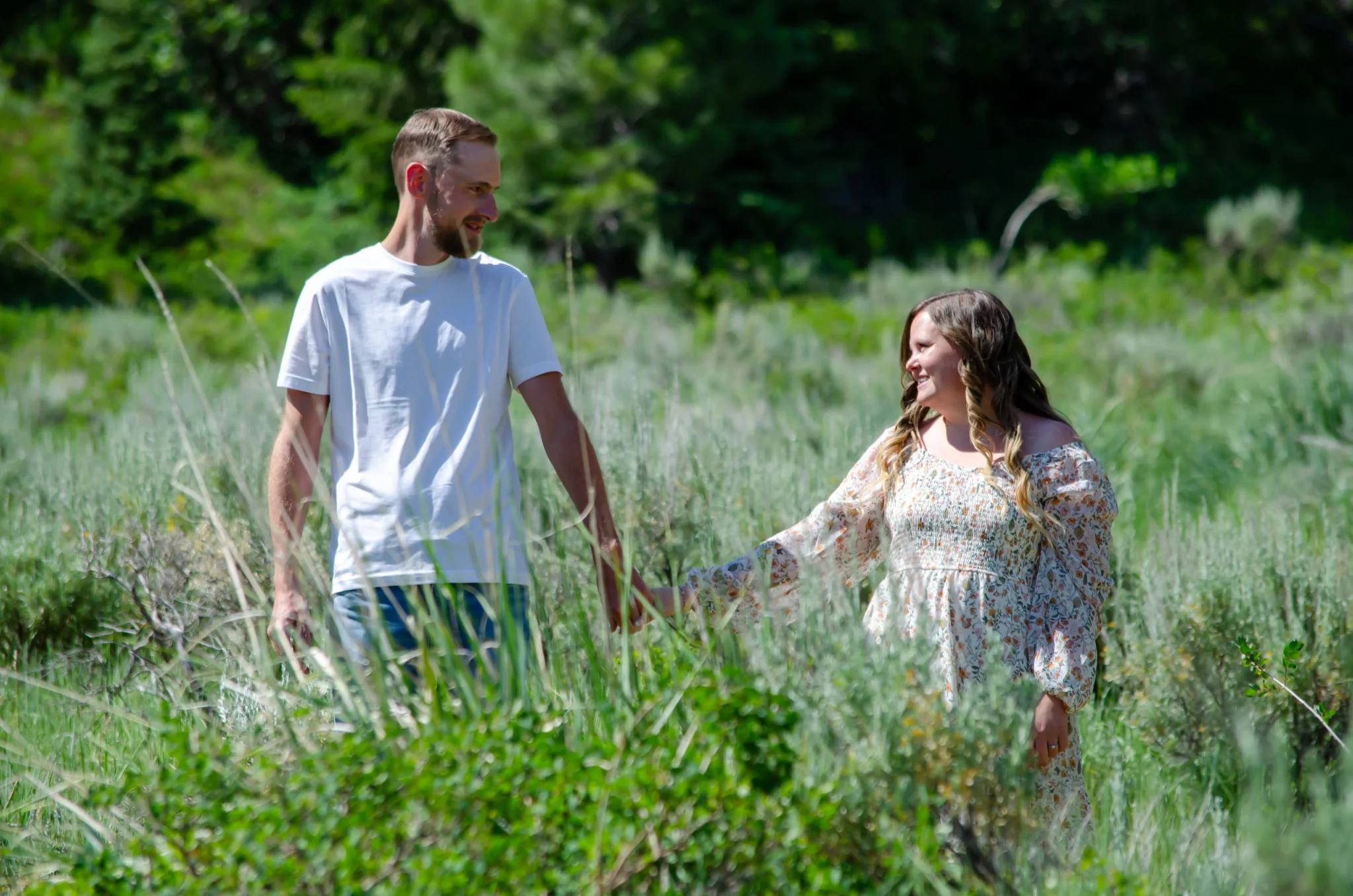 Tiff and Mitch walking hand in hand